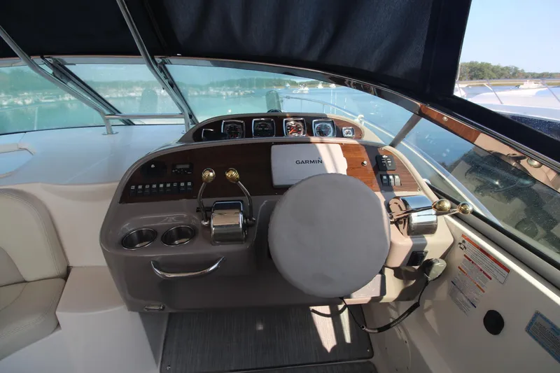 The image shows the helm of a 2008 Chaparral 350 Signature with modern instruments.