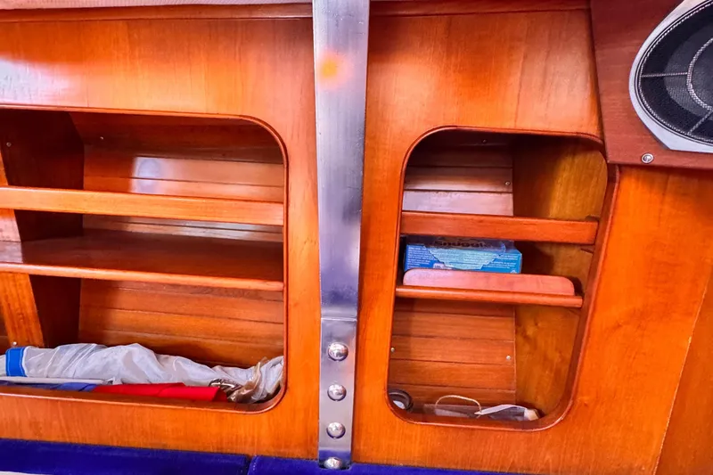 Wooden interior shelves on a 1982 Kelly Peterson 46 sailboat.