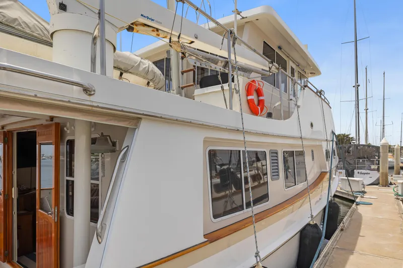 Kadey-Krogen 48 Whaleback yacht, 1996 model, docked at a marina.