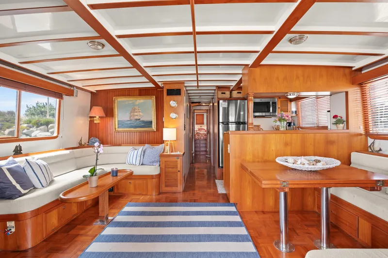 Luxurious interior of 1996 Kadey-Krogen 48 Whaleback yacht with wood finishes and modern amenities.