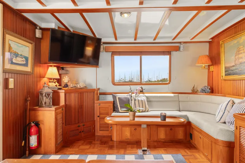 Luxurious 1996 Kadey-Krogen 48 Whaleback yacht interior with cozy seating and elegant decor.