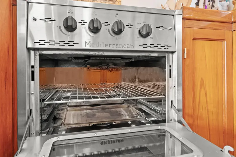 Stainless steel oven in 1996 Kadey-Krogen 48 Whaleback yacht kitchen.