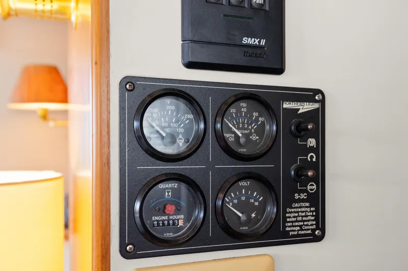 Control panel on 1996 Kadey-Krogen 48 Whaleback yacht with gauges and switches.
