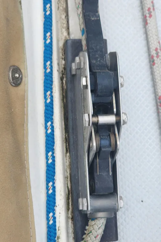 Close-up of a Catalina 42 MkII 1995 sailboat pulley system with ropes.