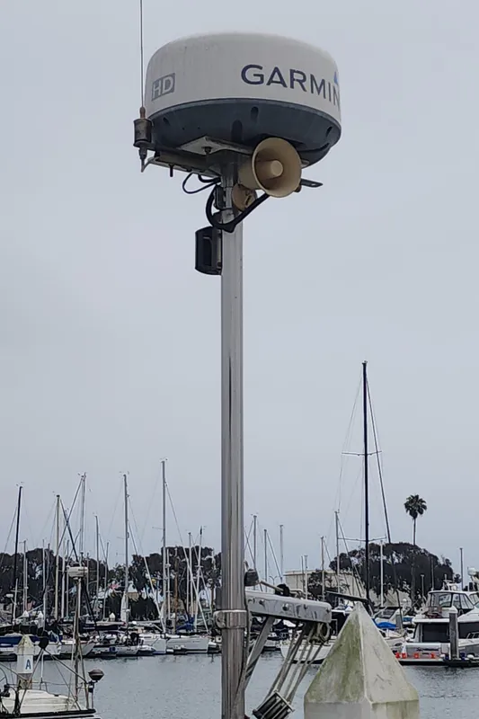 Garmin radar on Catalina 42 MkII sailboat, marina background, overcast sky.