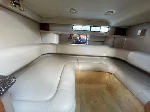 Interior of 2004 Formula 31 Performance Cruiser with beige upholstery.