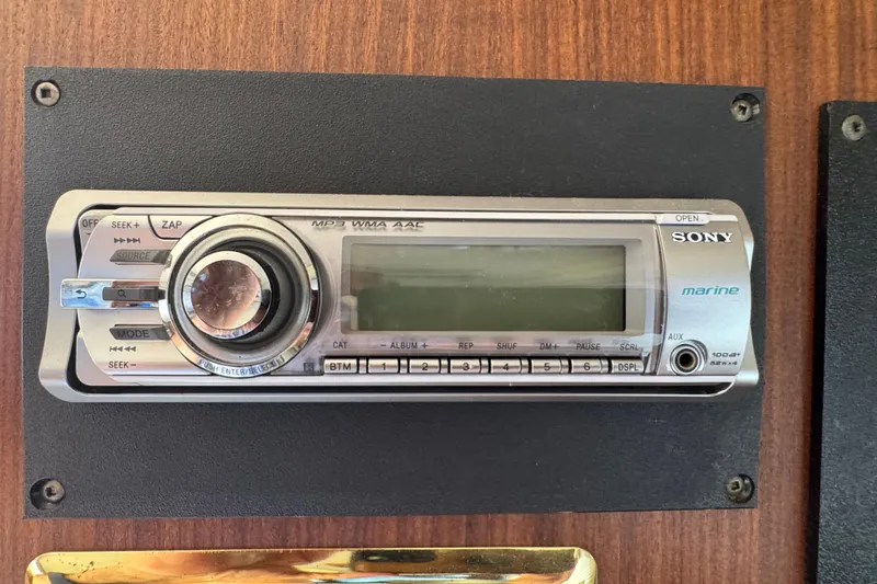 Sony marine stereo system on 1983 Hatteras 36 Convertible yacht dashboard.