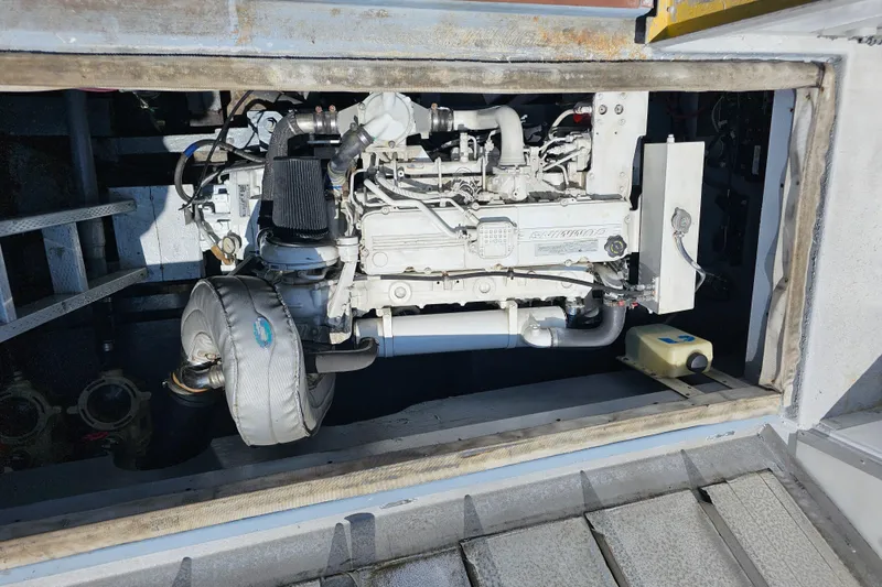 1958 Ditmar & Donaldson Sport boat engine compartment with visible machinery and components.