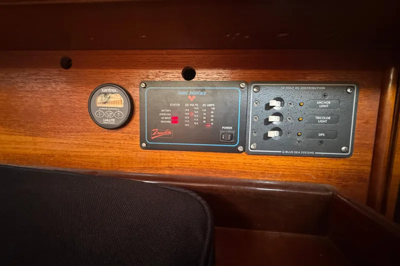 Control panel on a 1985 Beneteau First 38 sailboat, featuring Xantrex and Blue Sea Systems.