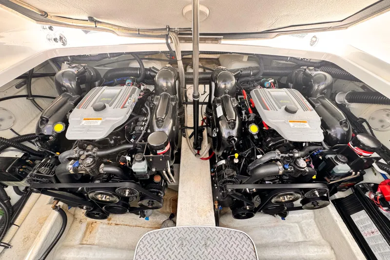 Engine compartment of a 2012 Formula 290 Sun Sport boat, featuring dual engines.