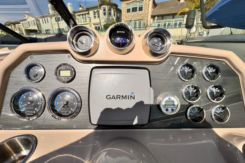 Dashboard of a 2012 Formula 290 Sun Sport boat with Garmin navigation system.
