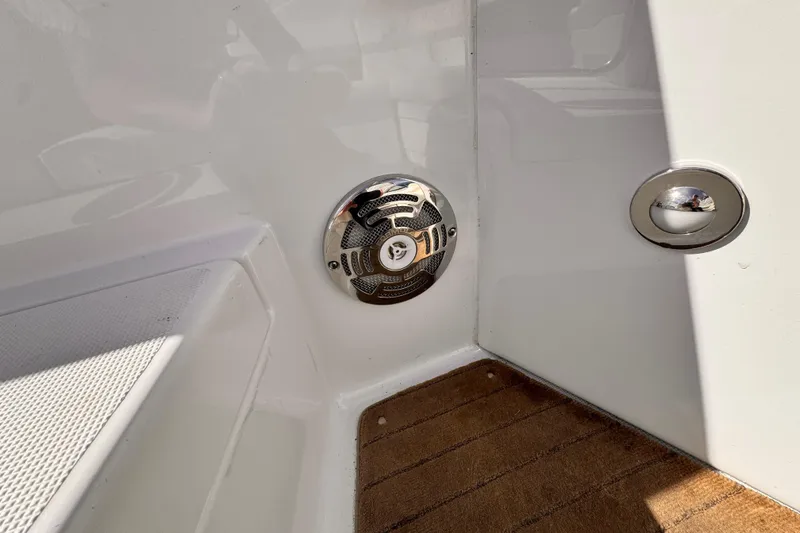 2012 Formula 290 Sun Sport boat interior with speaker and wooden flooring.