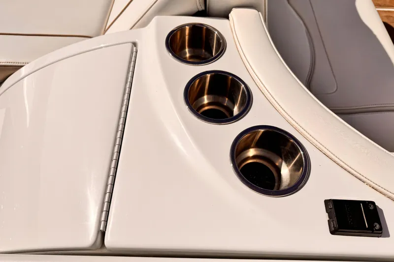2012 Formula 290 Sun Sport boat interior with cup holders and sleek design.