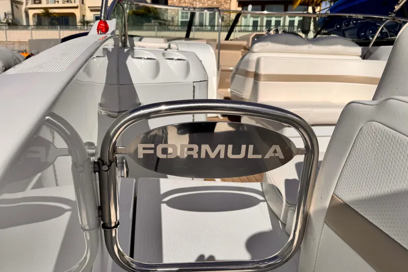 2012 Formula 290 Sun Sport boat interior with branded gate and seating.