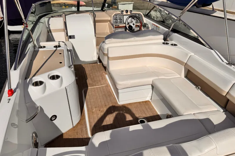2012 Formula 290 Sun Sport boat interior with luxurious seating and modern dashboard.