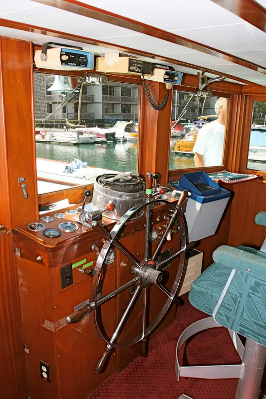 Helm of a classic 1946 J.M. Martinac yacht.