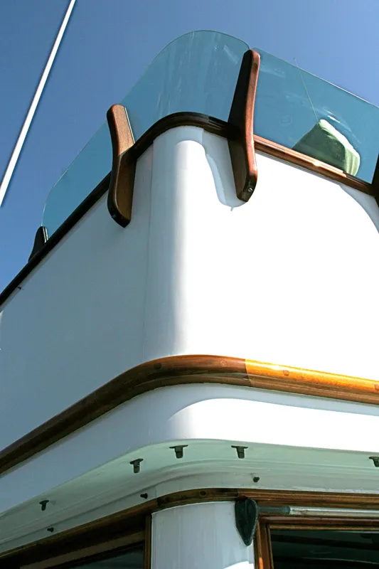 Detail view of a classic yacht with wood trim, built in 1946.