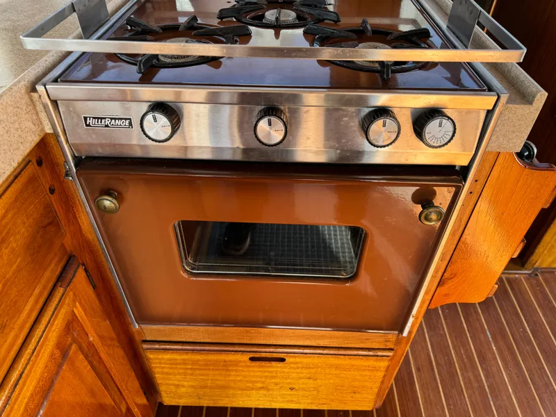 Vintage Hill Range stove in 1979 Californian LRC Sedan Bridge yacht kitchen.
