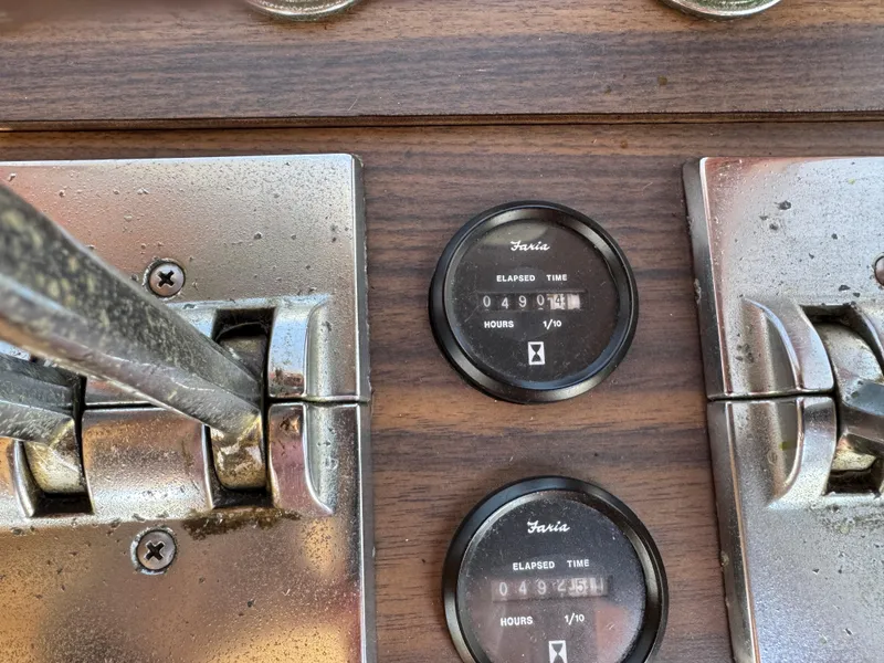 Control panel of a 1979 Californian LRC Sedan Bridge with elapsed time gauges.