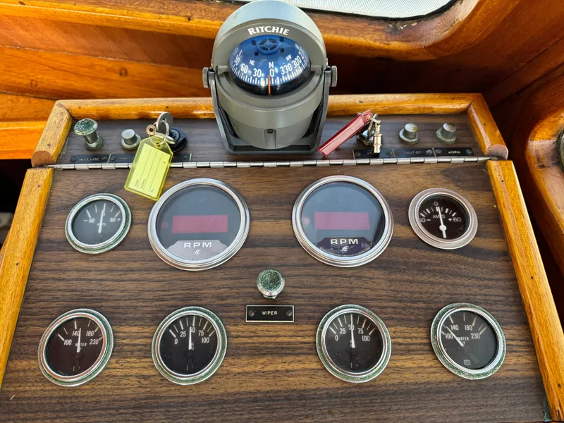 1979 Californian LRC Sedan Bridge dashboard with gauges and compass.