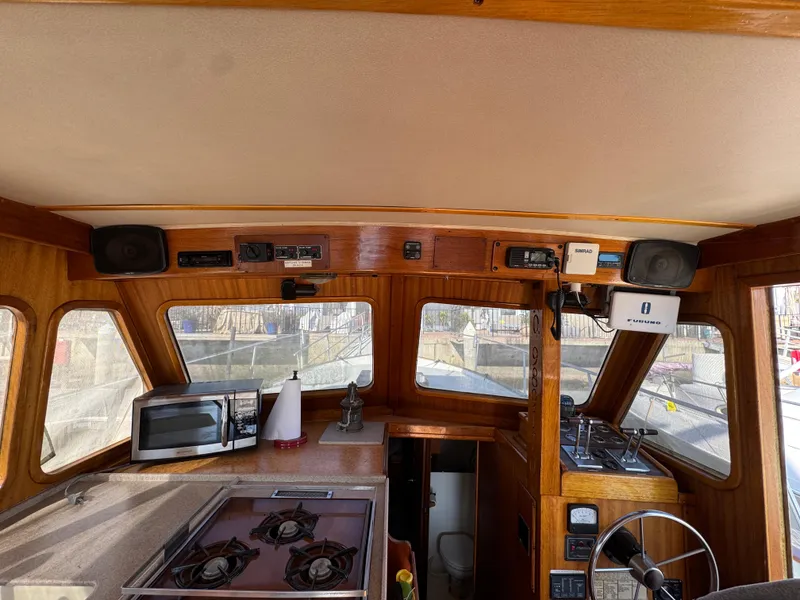 1979 Californian LRC Sedan Bridge interior with kitchen and navigation area.