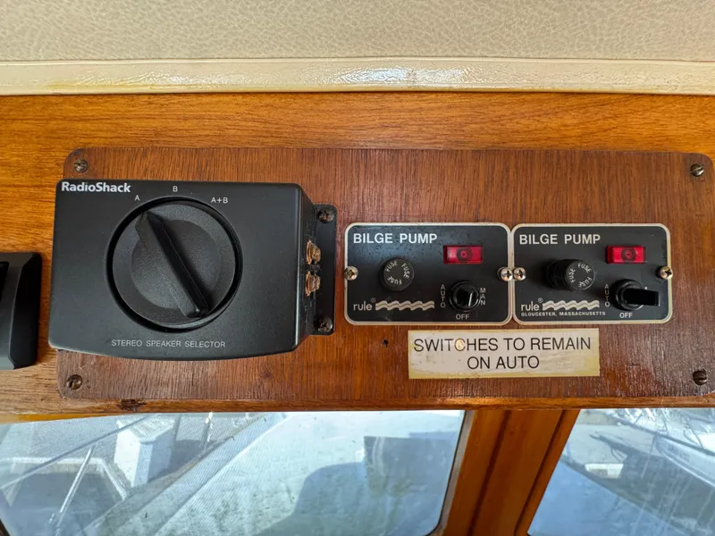 Control panel of a 1979 Californian LRC Sedan Bridge with bilge pump switches.