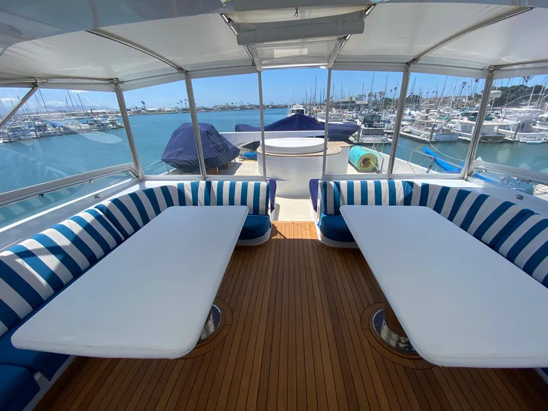 Looking aft with two large teak tables