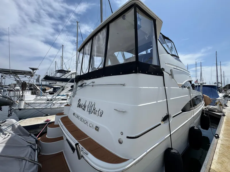 2004 Carver 366 Motor Yacht docked at marina, rear view.