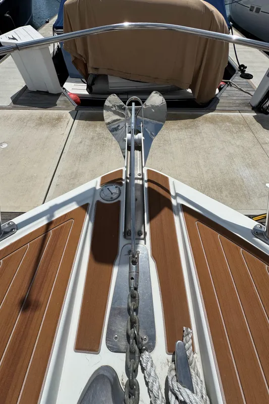 Bow of a 2004 Carver 366 Motor Yacht with anchor and chain on deck.