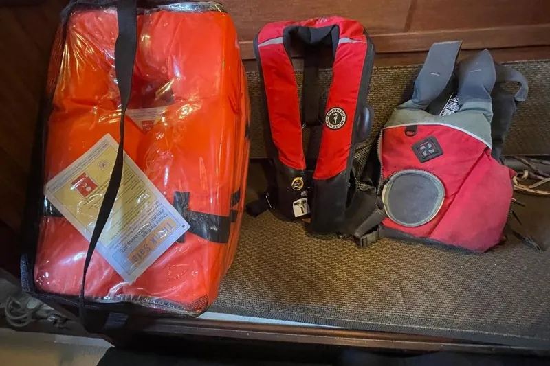 Life jackets and safety gear on a Custom Bodega 30, 1977 model.