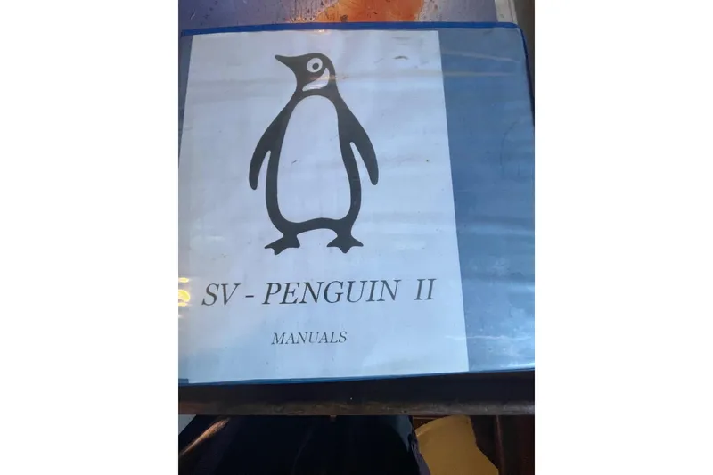 Manual cover for SV-Penguin II with penguin illustration, Custom Bodega 30, 1977.
