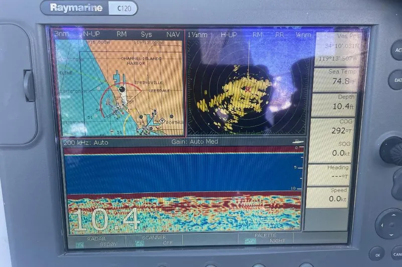 Raymarine C120 marine display showing navigation, radar, and sonar data on a Custom Bodega 30.