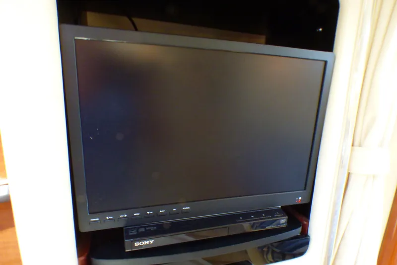 Sony TV and DVD player inside a 2002 Sea Ray 340 Sundancer yacht.