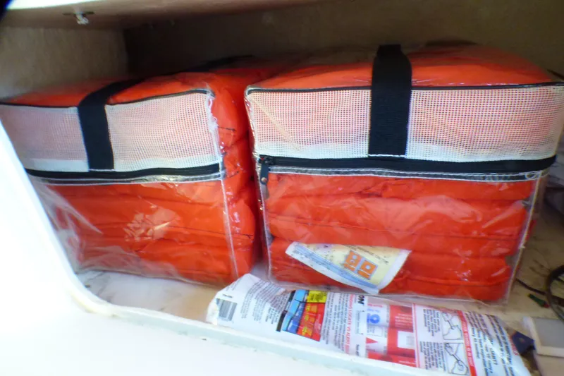 Life jackets stored on a 2002 Sea Ray 340 Sundancer boat.