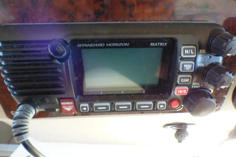 Standard Horizon Matrix radio on 2002 Sea Ray 340 Sundancer boat dashboard.