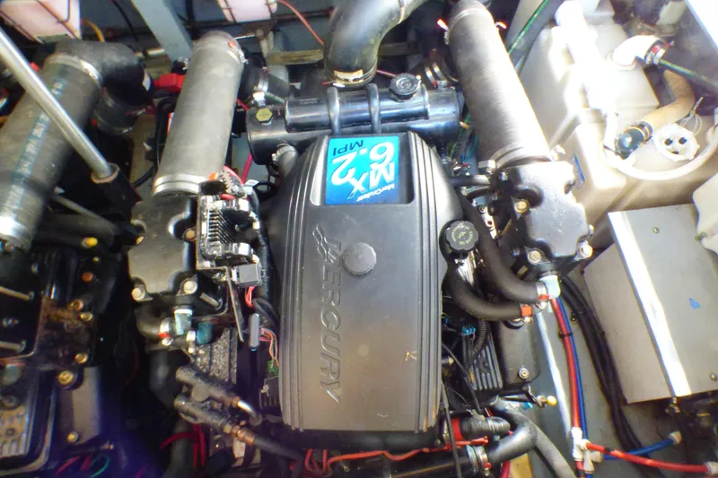 Engine of 2002 Sea Ray 340 Sundancer boat, featuring Mercury 6.2L MPI.