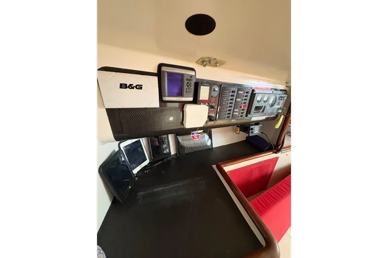 Control panel of a 1999 Laurie Davidson TP-52 yacht with navigation instruments.