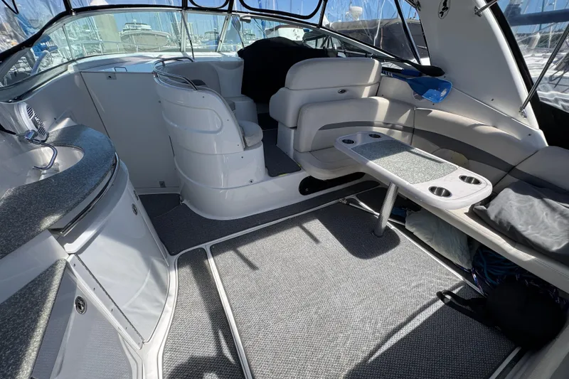 Interior of 2006 Chaparral Signature 350 yacht with seating and table.