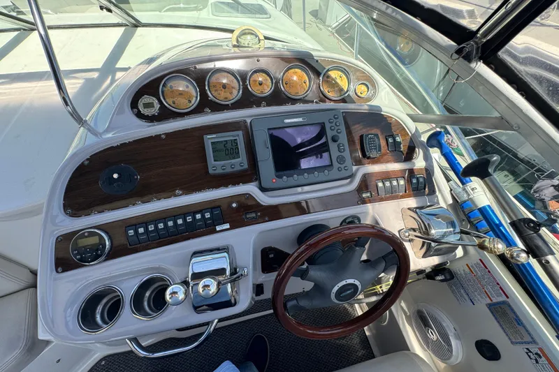 Helm of 2006 Chaparral Signature 350 with gauges, controls, and navigation equipment.
