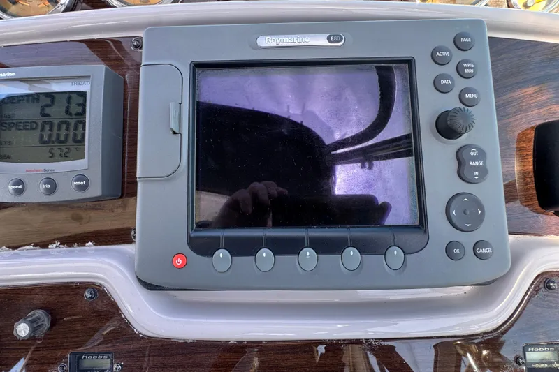 Control panel of a 2006 Chaparral Signature 350 boat with Raymarine display.