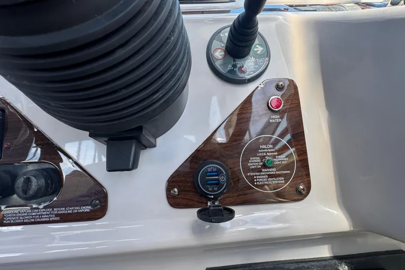 Control panel of a 2006 Chaparral Signature 350 boat with switches and indicators.