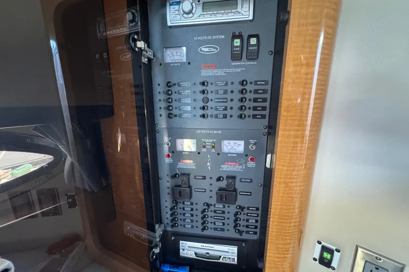 Electrical control panel inside a 2006 Chaparral Signature 350 boat cabin.