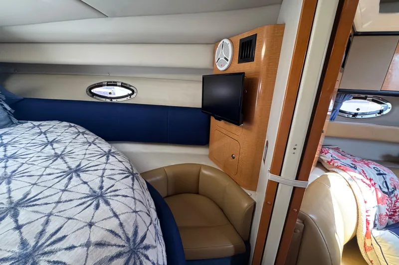 Interior of 2006 Chaparral Signature 350 yacht with cozy seating and modern amenities.