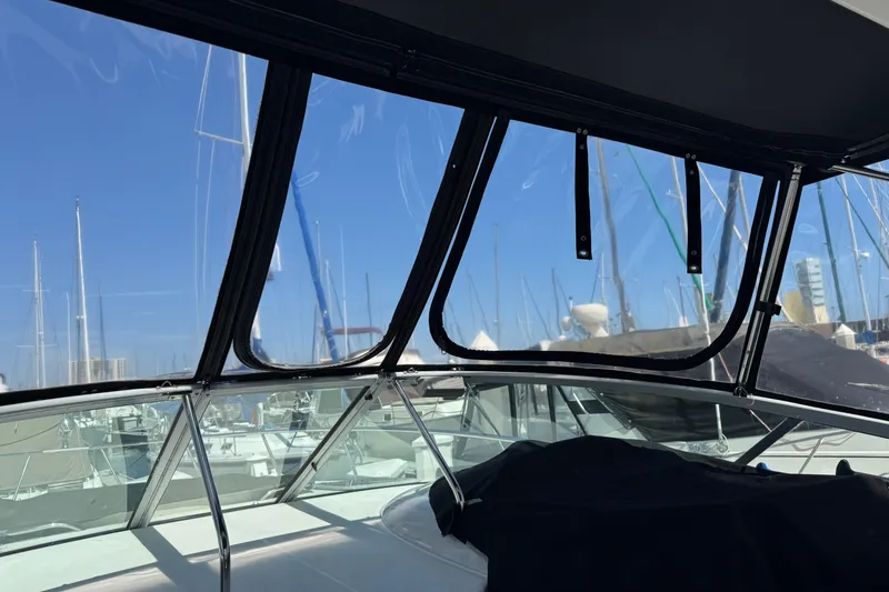2006 Chaparral Signature 350 boat interior with marina view through windows.