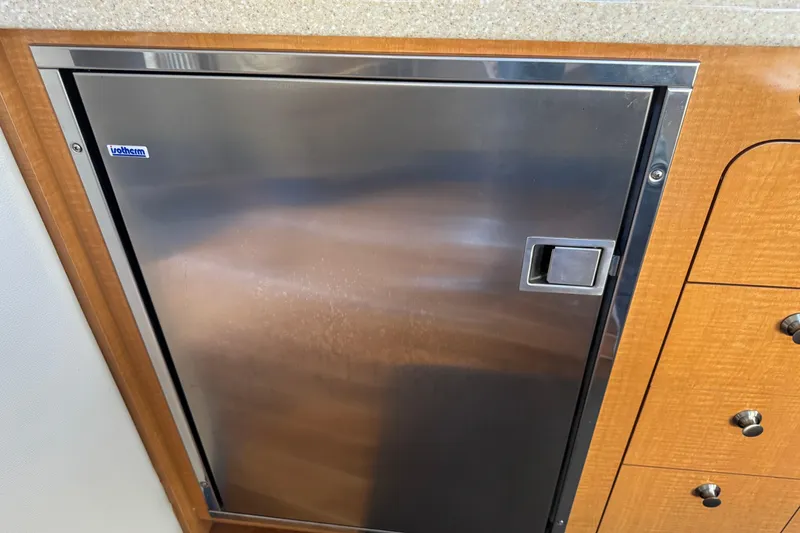 Stainless steel fridge in 2006 Chaparral Signature 350 yacht interior.