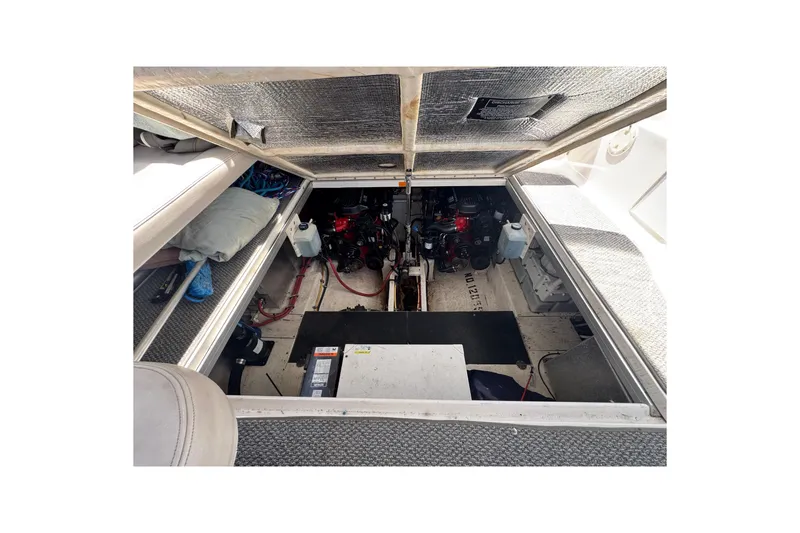 Engine compartment of a 2006 Chaparral Signature 350 boat, showcasing mechanical components.