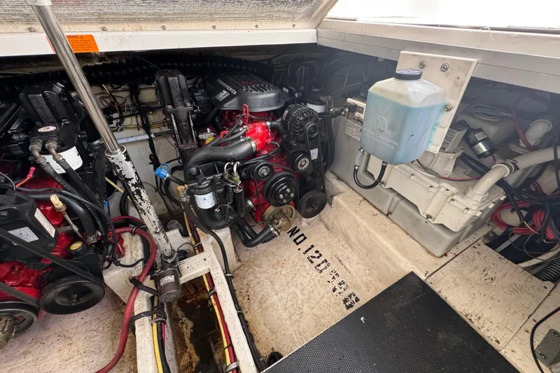 Engine compartment of a 2006 Chaparral Signature 350 boat, showcasing mechanical components.