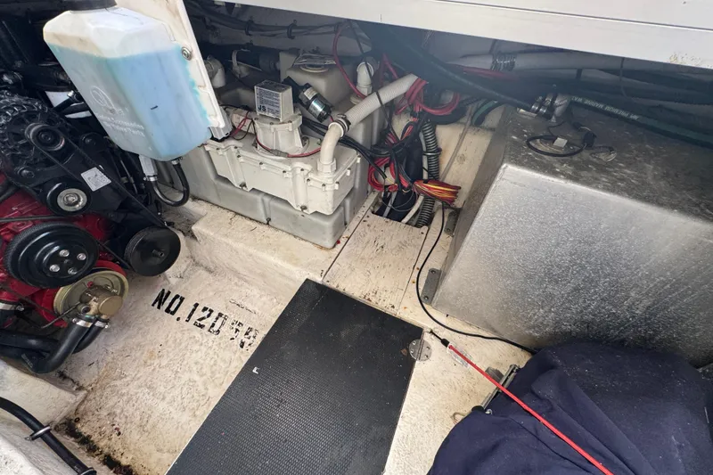 Engine compartment of a 2006 Chaparral Signature 350 boat, showing mechanical components.