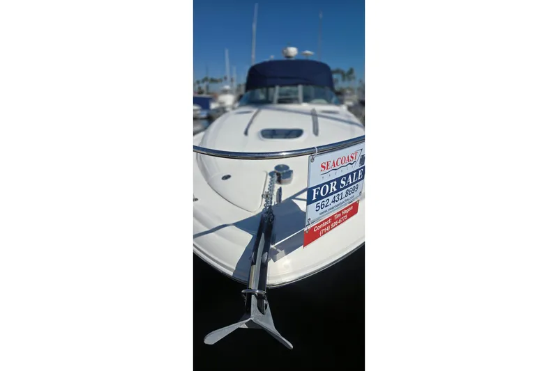 2005 Sea Ray 340 Sundancer yacht for sale, docked with visible contact information.