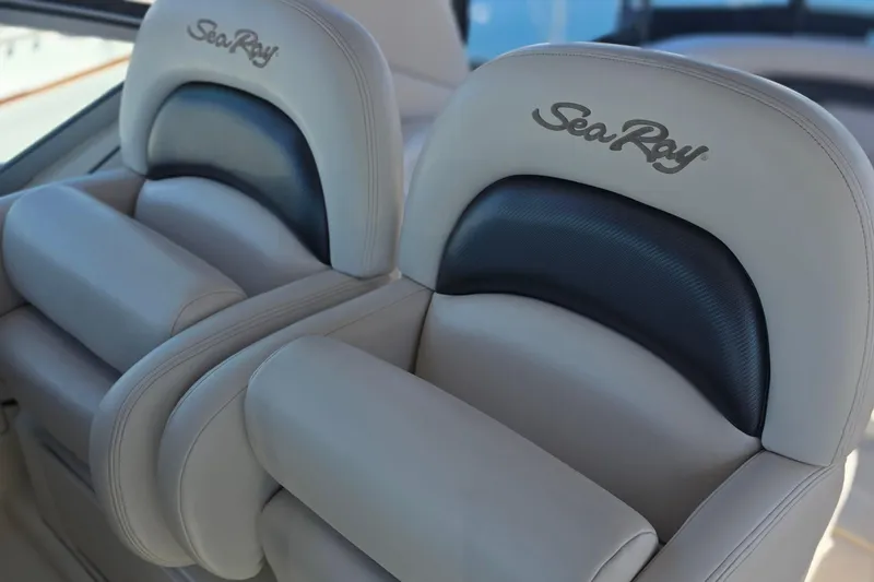 Luxury seating on a 2005 Sea Ray 340 Sundancer boat, featuring plush upholstery.